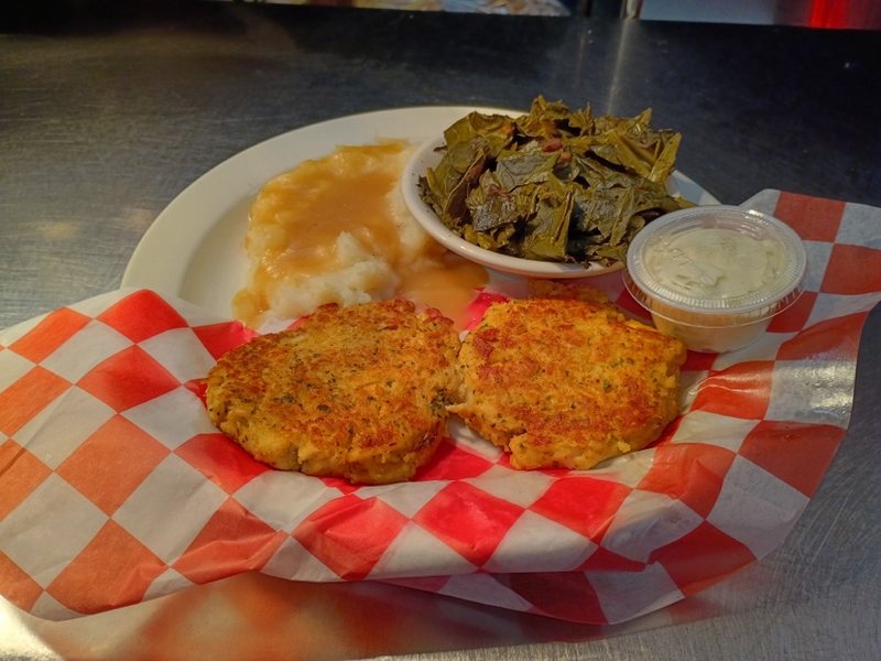G Ma's Famous crab cakes with mashed potatoes, gravy and collard greens